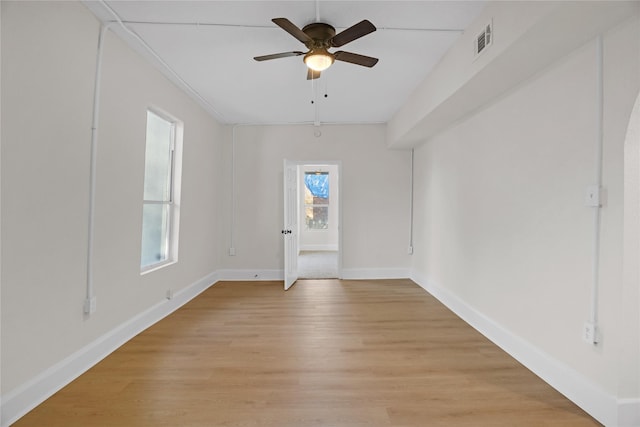 unfurnished room featuring ceiling fan and light hardwood / wood-style flooring