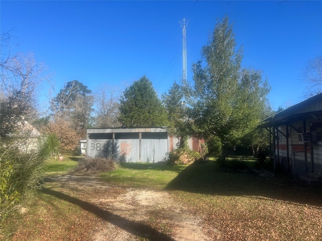 view of yard with an outdoor structure