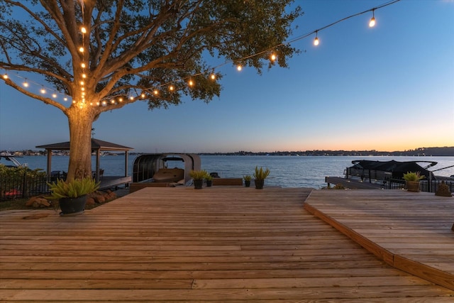 view of dock with a water view