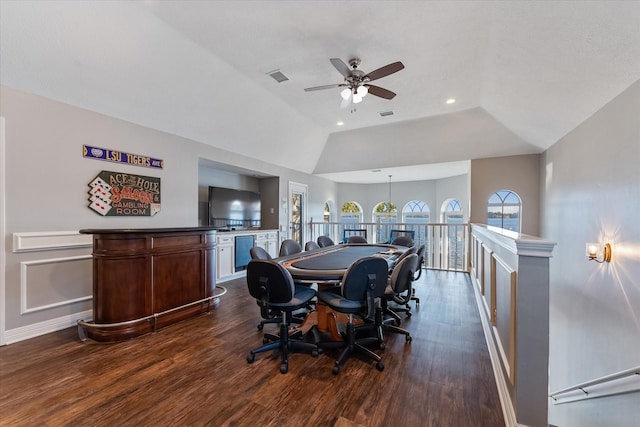 dining area featuring ceiling fan, dark hardwood / wood-style floors, and lofted ceiling