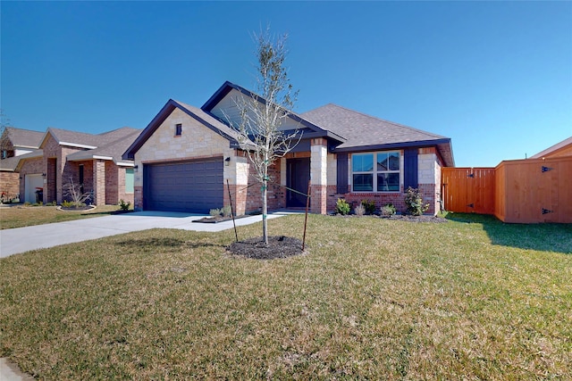 view of front facade featuring a garage, brick siding, concrete driveway, a gate, and a front yard