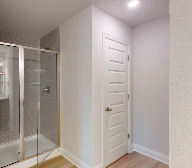 19818 Paros Island Dr, Hockley, TX 77447 - full bath with wood finished floors and a stall shower