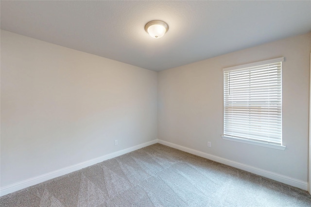 19818 Paros Island Dr, Hockley, TX 77447 - unfurnished room with carpet flooring and baseboards