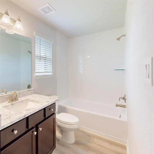 19818 Paros Island Dr, Hockley, TX 77447 - bathroom featuring vanity, wood finished floors, and bathtub / shower combination