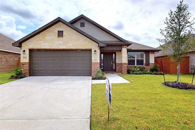 19818 Paros Island Dr, Hockley, TX 77447 - view of front of home featuring concrete driveway, a garage, and brick siding