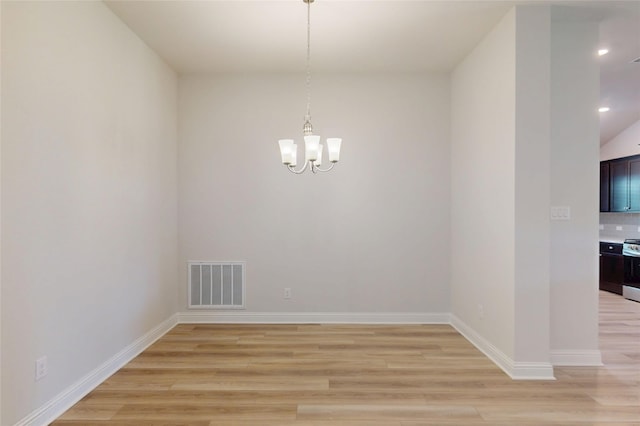 19818 Paros Island Dr, Hockley, TX 77447 - unfurnished dining area with a chandelier, light wood-style floors, and recessed lighting