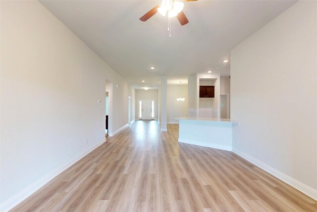 19818 Paros Island Dr, Hockley, TX 77447 - unfurnished living room featuring light wood finished floors, a ceiling fan, and recessed lighting