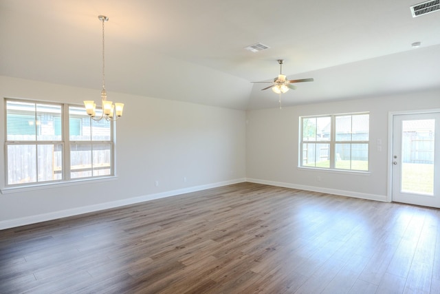 22207 Kastoria Dr, Hockley, TX 77447 - unfurnished room with a chandelier, wood finished floors, lofted ceiling, and a ceiling fan
