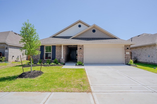 22207 Kastoria Dr, Hockley, TX 77447 - view of front facade featuring an attached garage, a front yard, brick siding, and driveway