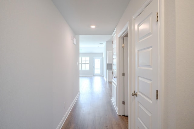 22207 Kastoria Dr, Hockley, TX 77447 - hall with dark wood-type flooring and recessed lighting