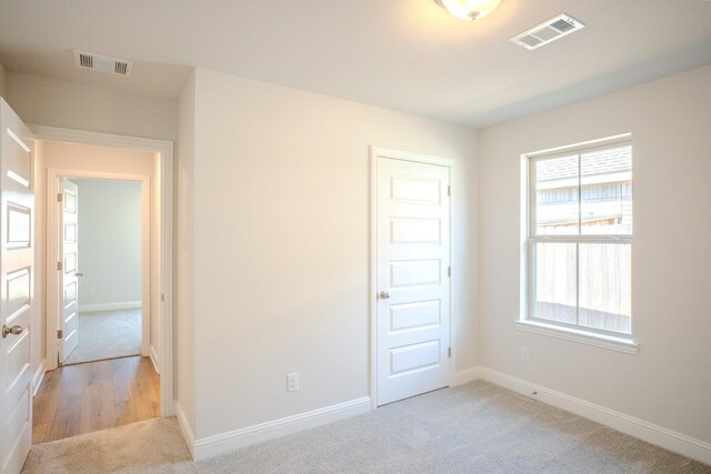 22207 Kastoria Dr, Hockley, TX 77447 - unfurnished bedroom with carpet flooring