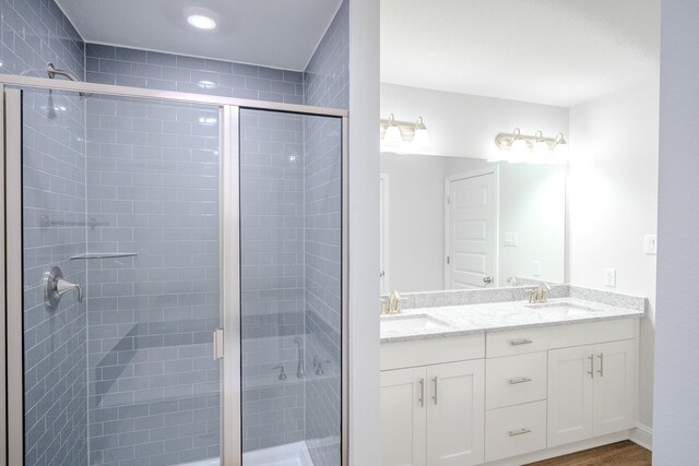 22207 Kastoria Dr, Hockley, TX 77447 - full bath featuring double vanity and a shower stall