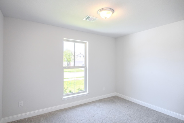 22207 Kastoria Dr, Hockley, TX 77447 - carpeted empty room featuring plenty of natural light