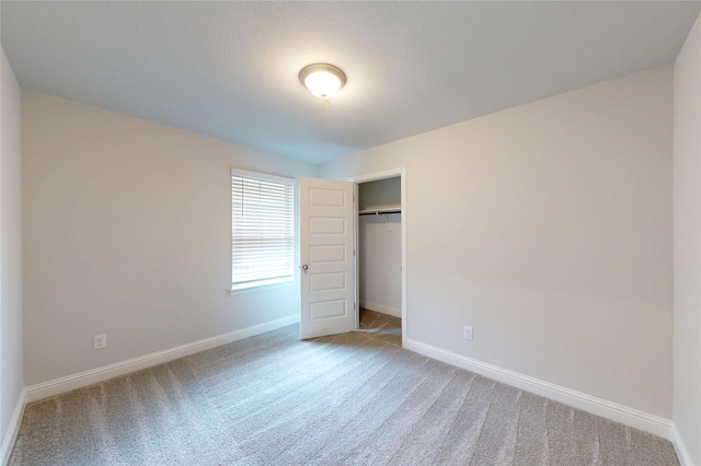 19814 Paros Island Dr, Hockley, TX 77447 - unfurnished bedroom with carpet flooring and a closet