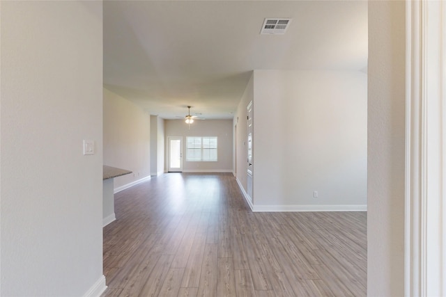 19814 Paros Island Dr, Hockley, TX 77447 - spare room with wood finished floors and ceiling fan
