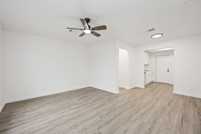 interior space with ceiling fan and light wood-type flooring