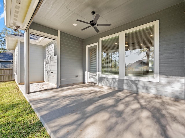 view of patio featuring ceiling fan