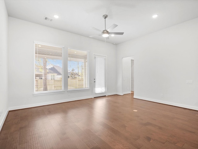 unfurnished room featuring hardwood / wood-style flooring and ceiling fan