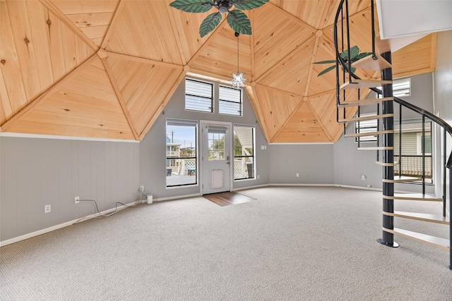 bonus room with ceiling fan, carpet floors, and wooden ceiling