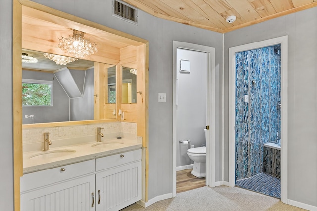 bathroom featuring vanity, wood-type flooring, wooden ceiling, a chandelier, and toilet