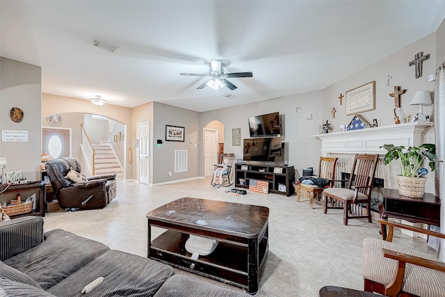 living room with ceiling fan