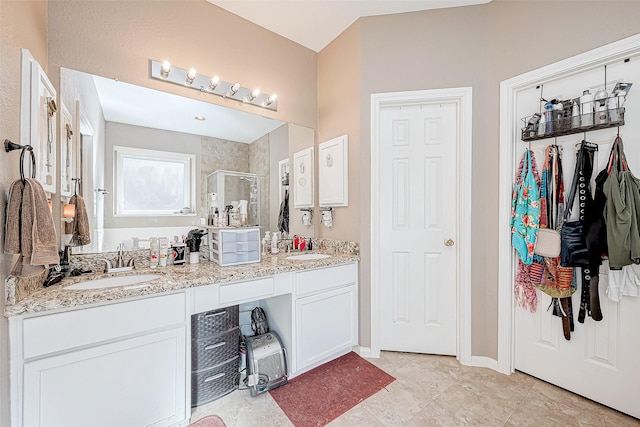 bathroom featuring vanity and walk in shower