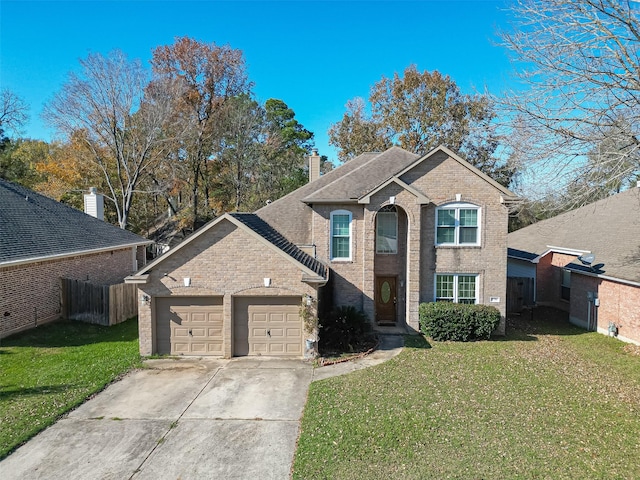 front facade with a garage and a front yard