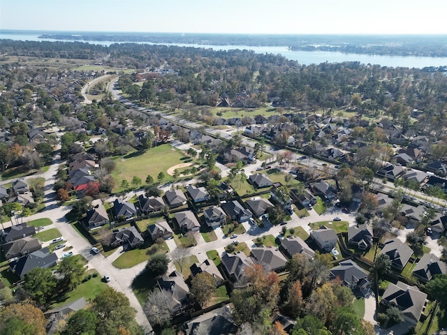 bird's eye view with a water view