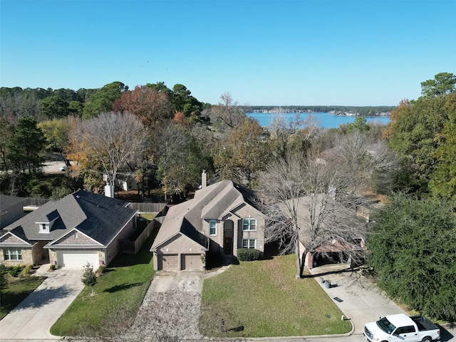 drone / aerial view with a water view