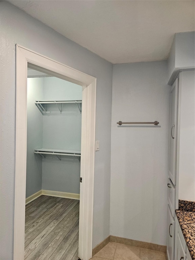 bathroom with wood-type flooring and vanity