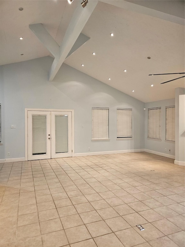 unfurnished room with beamed ceiling, light tile patterned floors, high vaulted ceiling, and french doors