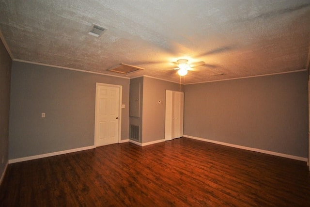 interior space with a textured ceiling, ceiling fan, and dark wood-type flooring