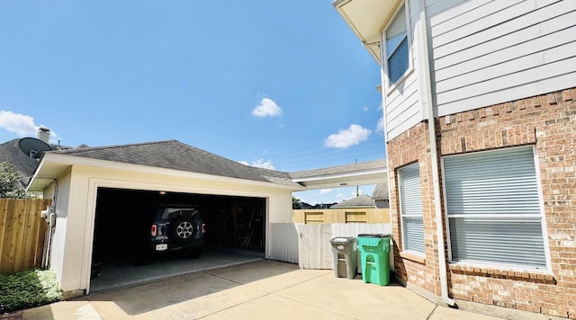 view of property exterior with a garage