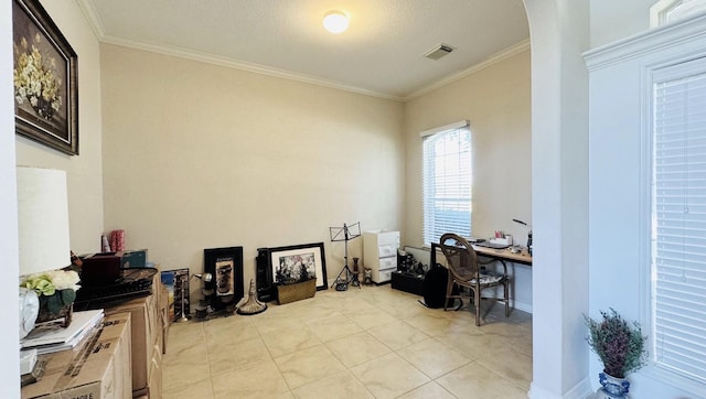 tiled office with a textured ceiling and crown molding