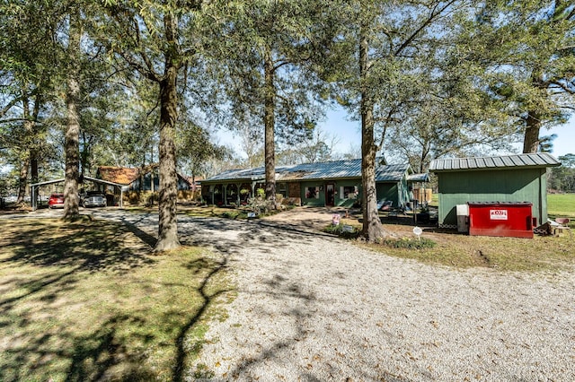 ranch-style home with a carport