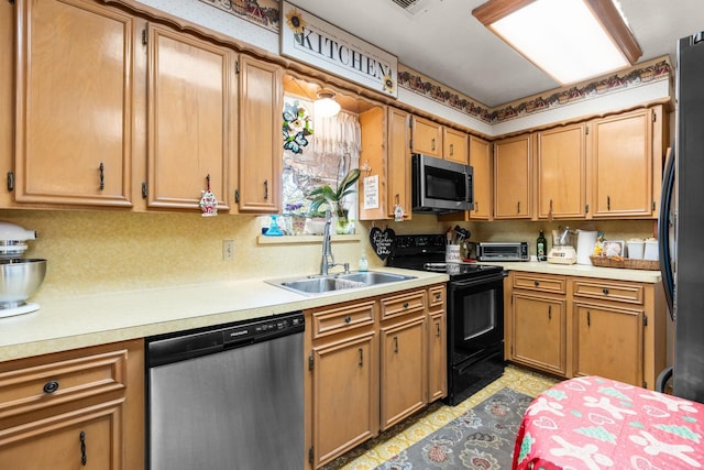 kitchen with stainless steel appliances and sink