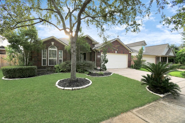 ranch-style home featuring a garage and a front yard