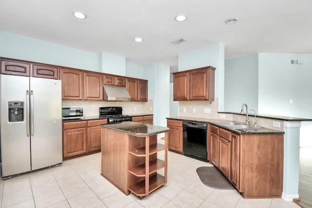 kitchen featuring light tile patterned flooring, black appliances, sink, a kitchen island, and kitchen peninsula