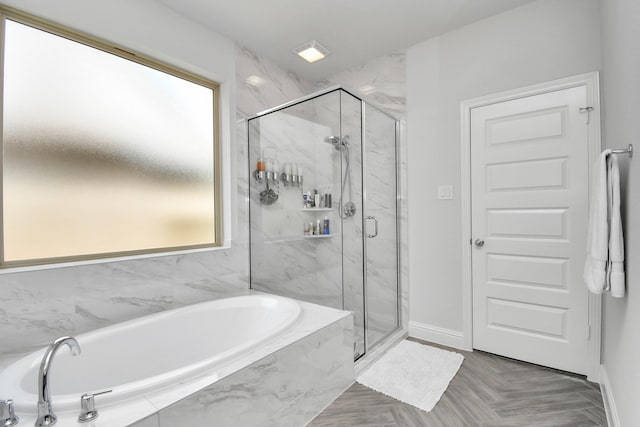 bathroom featuring plus walk in shower