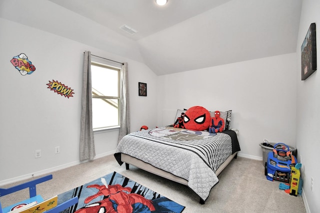 carpeted bedroom featuring vaulted ceiling