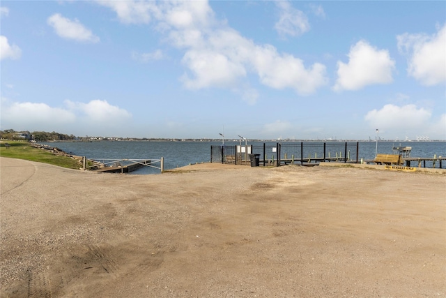 dock area with a water view