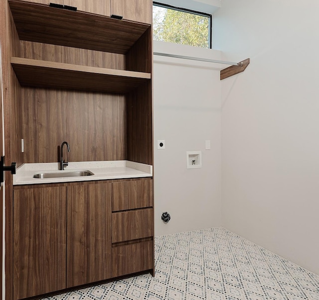 laundry area featuring hookup for a washing machine, electric dryer hookup, and sink