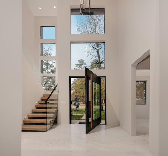 entryway featuring a high ceiling