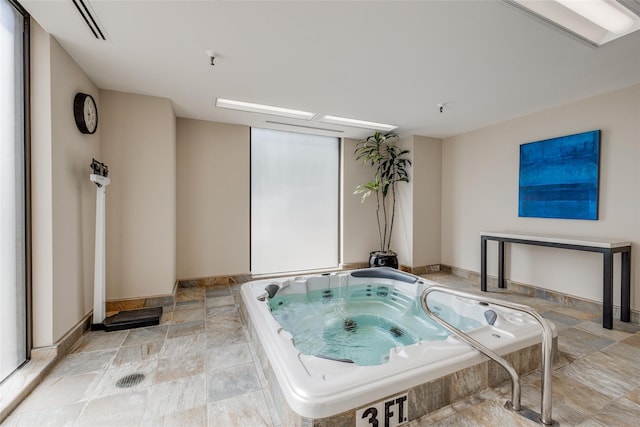 interior space featuring an indoor hot tub