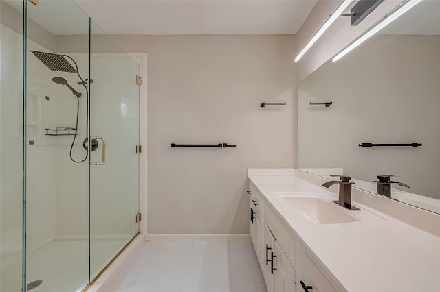 bathroom with tile patterned floors, vanity, and an enclosed shower