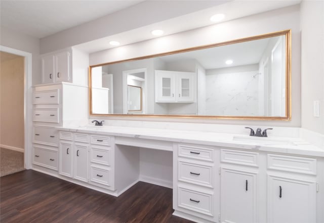 bathroom featuring vanity and hardwood / wood-style flooring