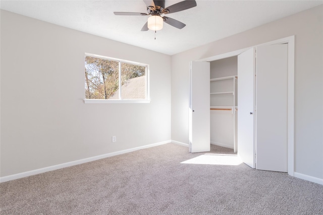 unfurnished bedroom featuring carpet flooring, ceiling fan, and a closet