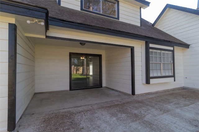 property entrance featuring a patio