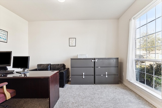 office space with light colored carpet and plenty of natural light