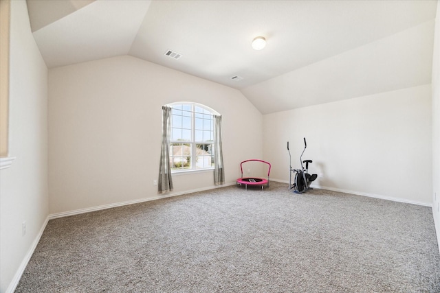 recreation room featuring carpet flooring and lofted ceiling